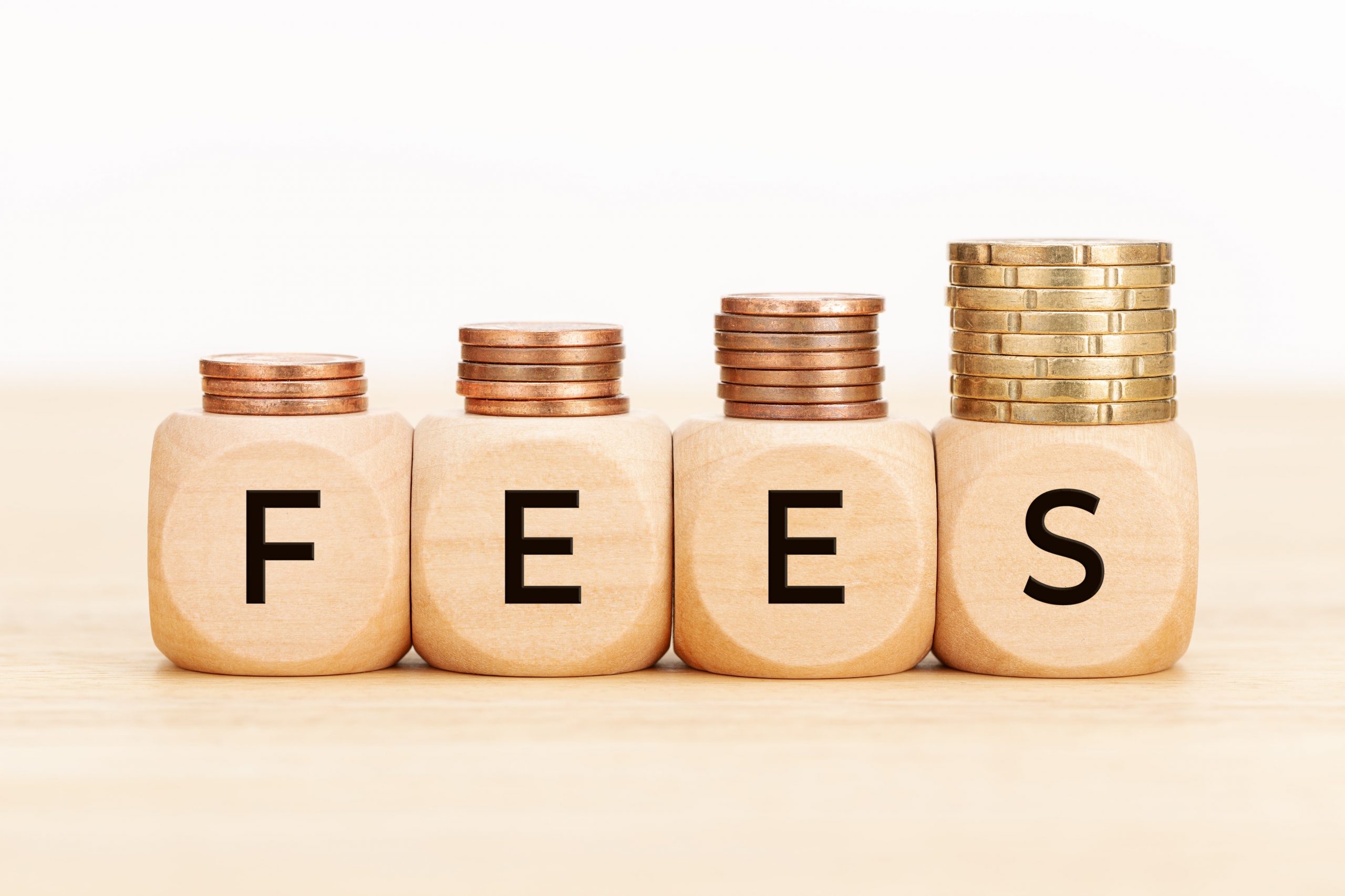 Fees word written on wooden blocks and it shows how automating fees collection is important